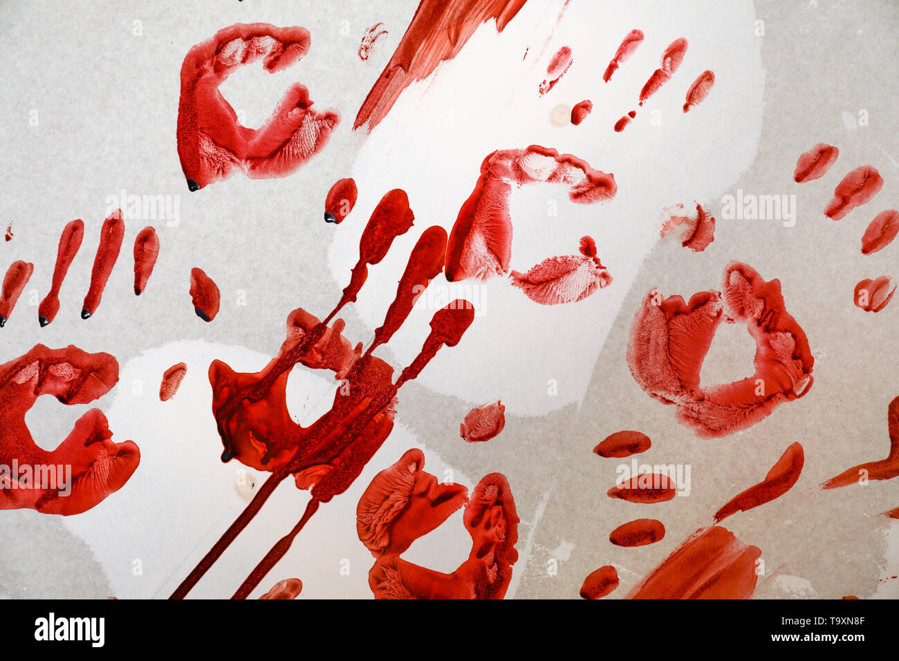 Bloody palm stampe su muro Foto Stock