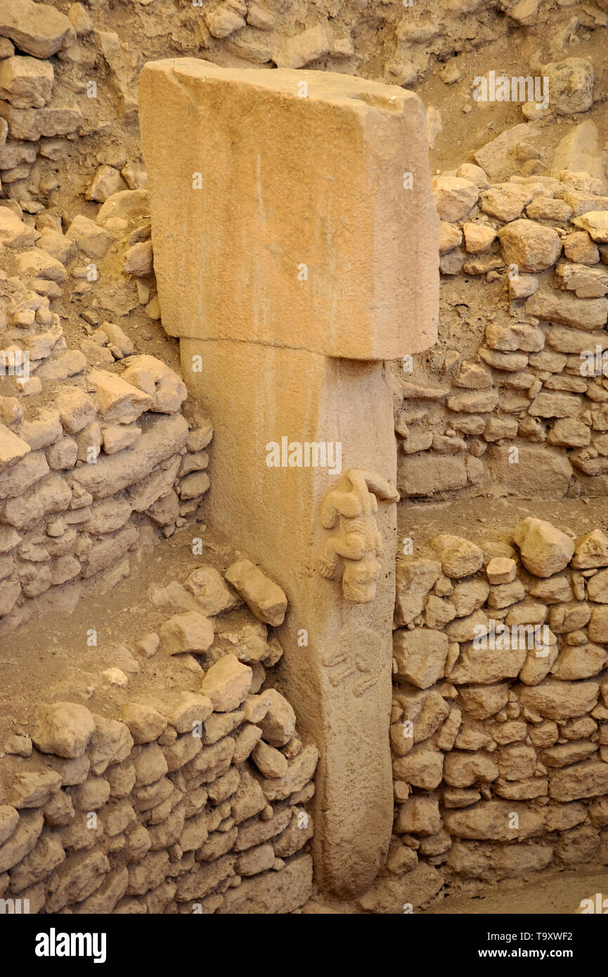 Antiche rovine con animali scolpiti in pietra a Gobekli Tepe, Sanliurfa, Turchia Foto Stock