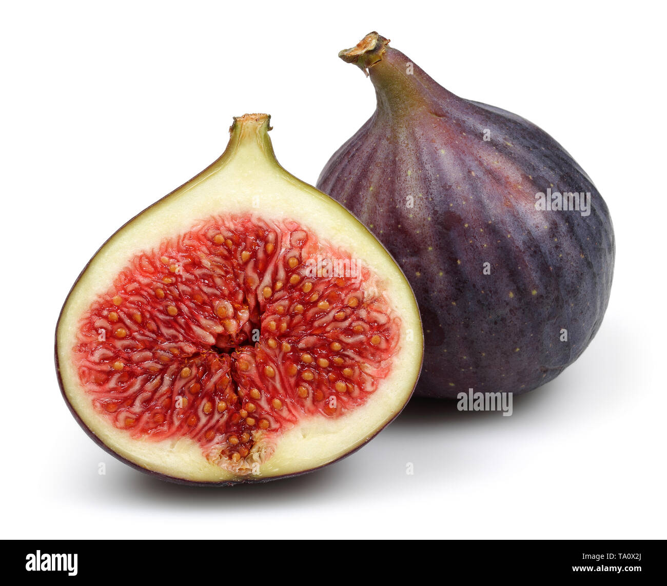 Viola fresca fig frutta e slice isolati su sfondo bianco Foto Stock