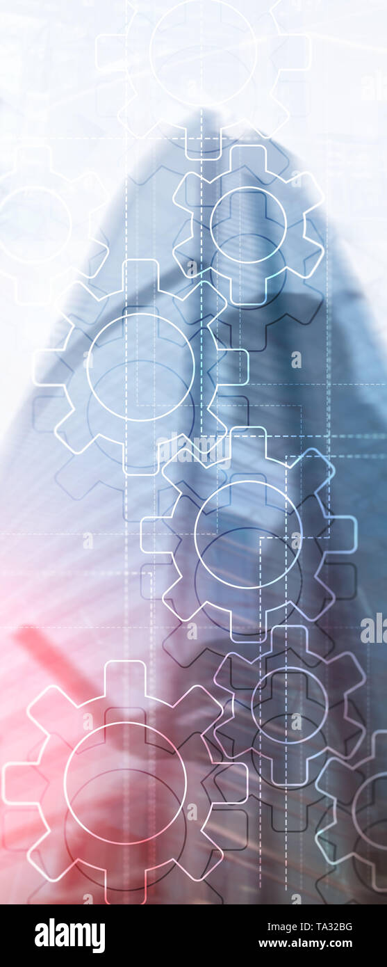 Panorama verticale Banner. Doppia esposizione meccanismo di ingranaggi su sfondo sfocato. Business e processo industriale il concetto di automazione Foto Stock