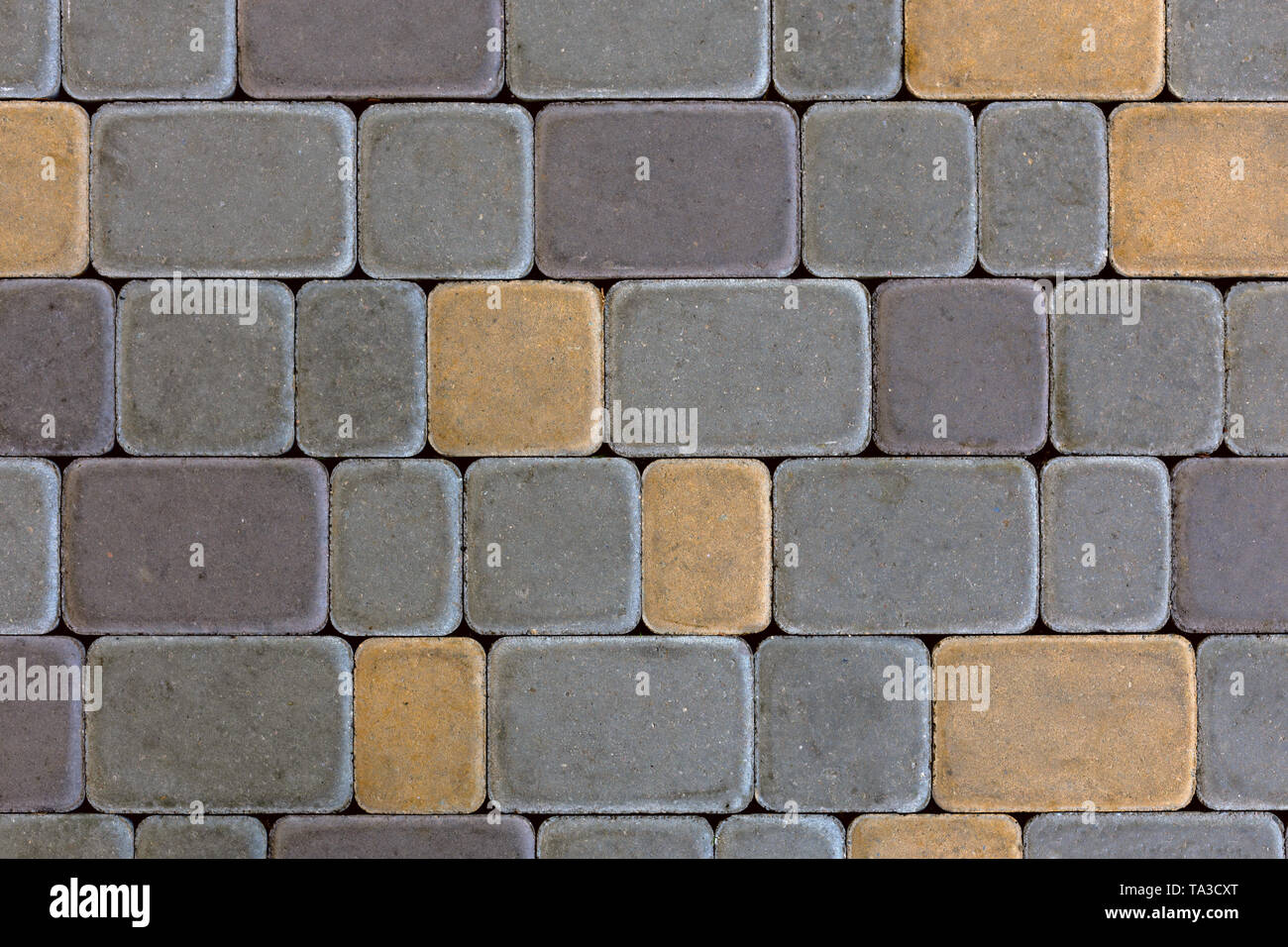 Moderno rettangolo artificiale di pietra pavimentazione lineare con angoli tondi di consistenza e di sfondo Foto Stock