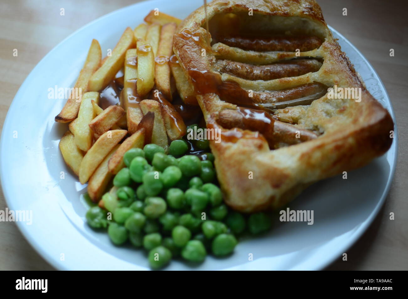 Il rospo salsiccia tradizionale piatto inglese Foto Stock