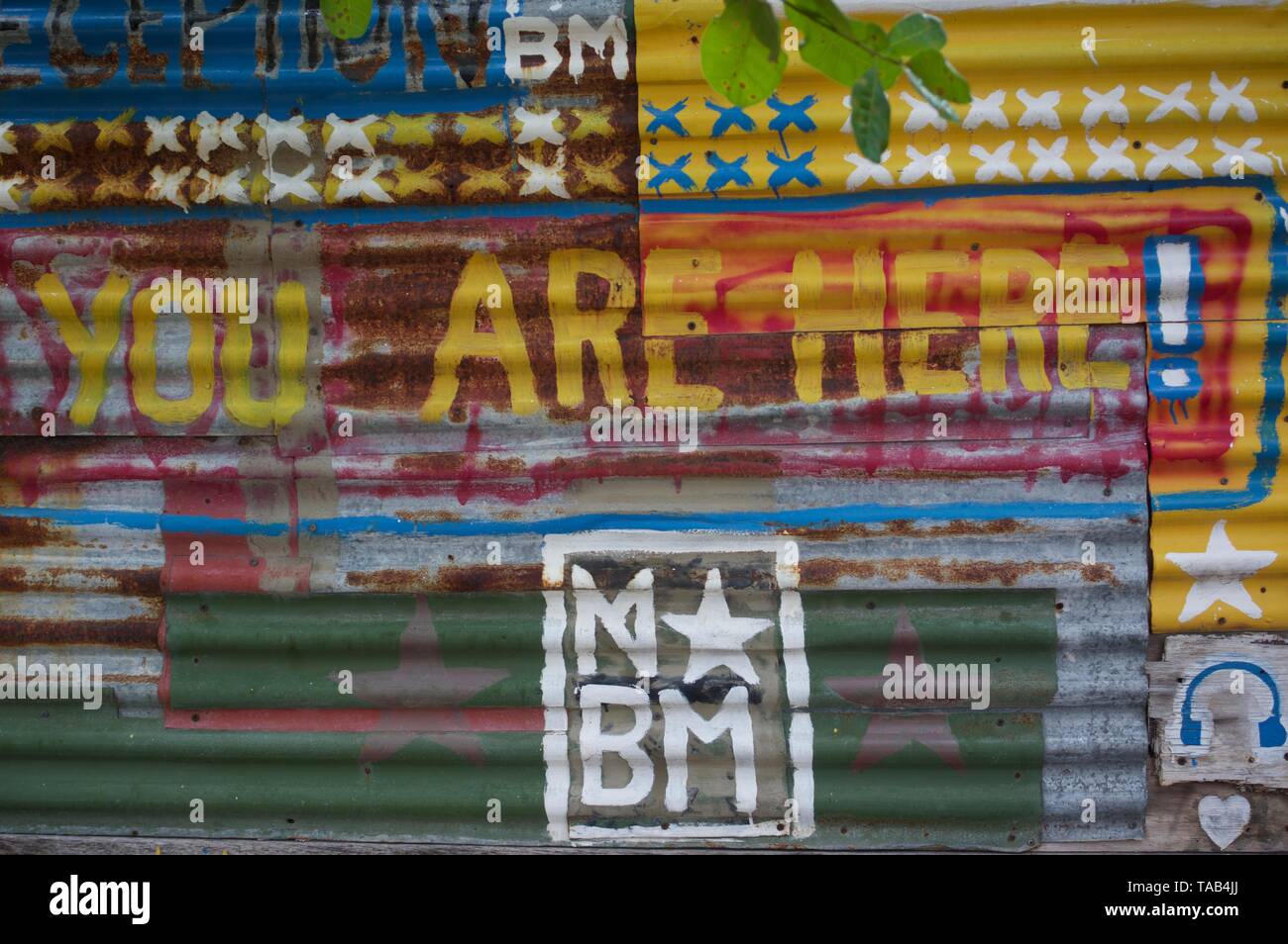 Siete qui graffiti segno Foto Stock