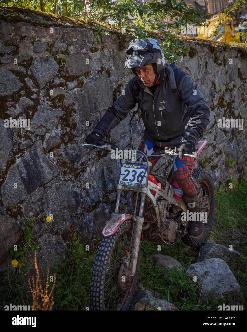 Motorcylist prendendo parte alla endurance Scottish sei giorni di prove in Fort William nelle Highlands della Scozia Foto Stock