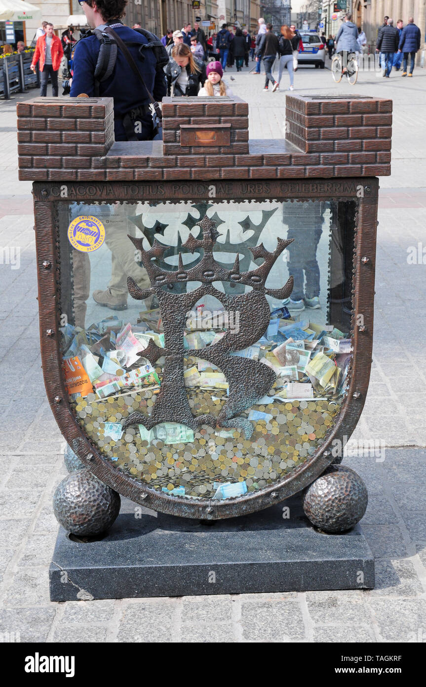 Il denaro donato dal pubblico. Cracovia. Foto Stock