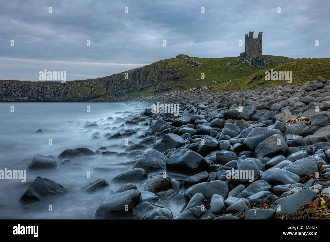 Il castello di Dunstanburgh, Craster, Northumberland, England, Regno Unito, Europa Foto Stock