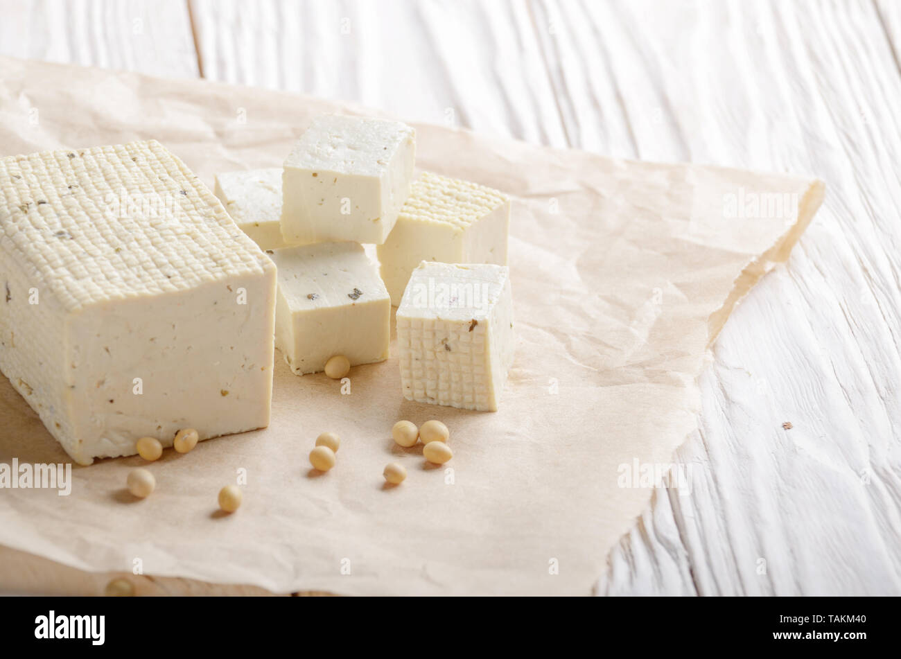 Fagiolo di Soia Curd tofu su carta pergamena non a base di latte sostituto alternativo per formaggio Foto Stock