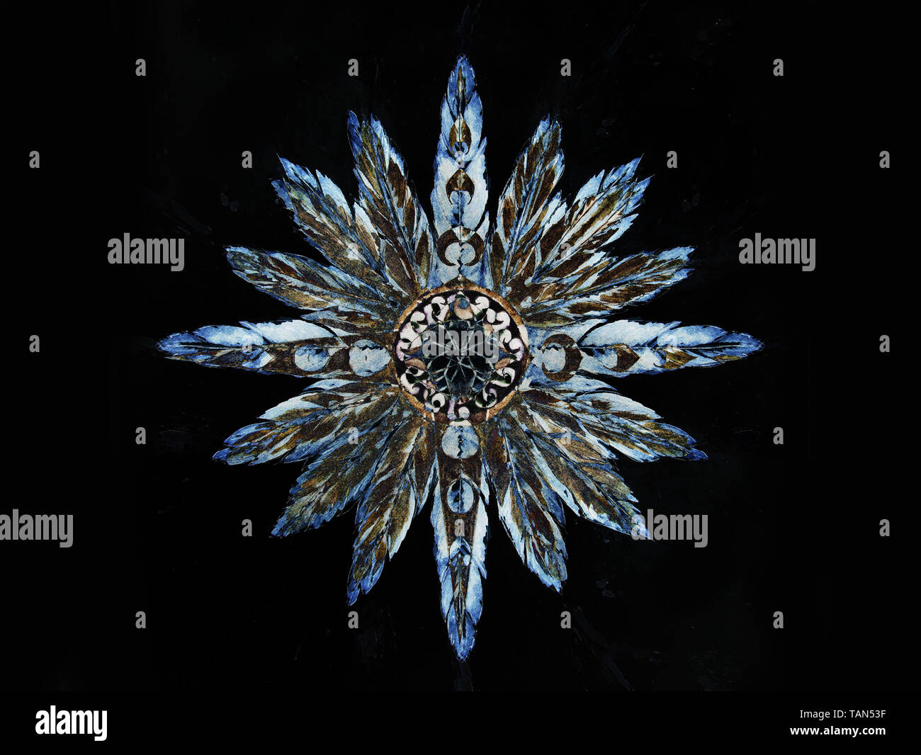 Grafici ornamentali in forma di una stella con piume Foto Stock