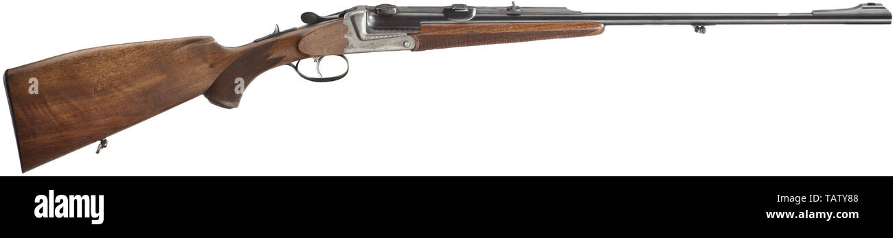 Una caduta Fanzoi canna di fucile, Ferlach, Cal. 7 x 57R, n. 2010.50. Foro luminoso, lunghezza 62,5 cm, brunito. Prova austriaco mark. Sulla canna guilloched costola firmato "Fanzoi - Ferlach'. Spia fissa. SEM-base per montaggio su campo. Double barrel gancio di bloccaggio. Espulsore. Lato sistema di armamento - Francese impostare trigger. Azione in francese grigio con luce incisioni ornamentali, sul lato di fondo del camoscio. Olio di noce-stock finito con il porco-back, guance, impugnatura a pistola e checkring. Segni minimi di utilizzo su stock. Leggera, ben bilanciata fucile di montagna in quasi come nuova condizione. Lunghezza 105 , Additional-Rights-Clearance-Info-Not-Available Foto Stock