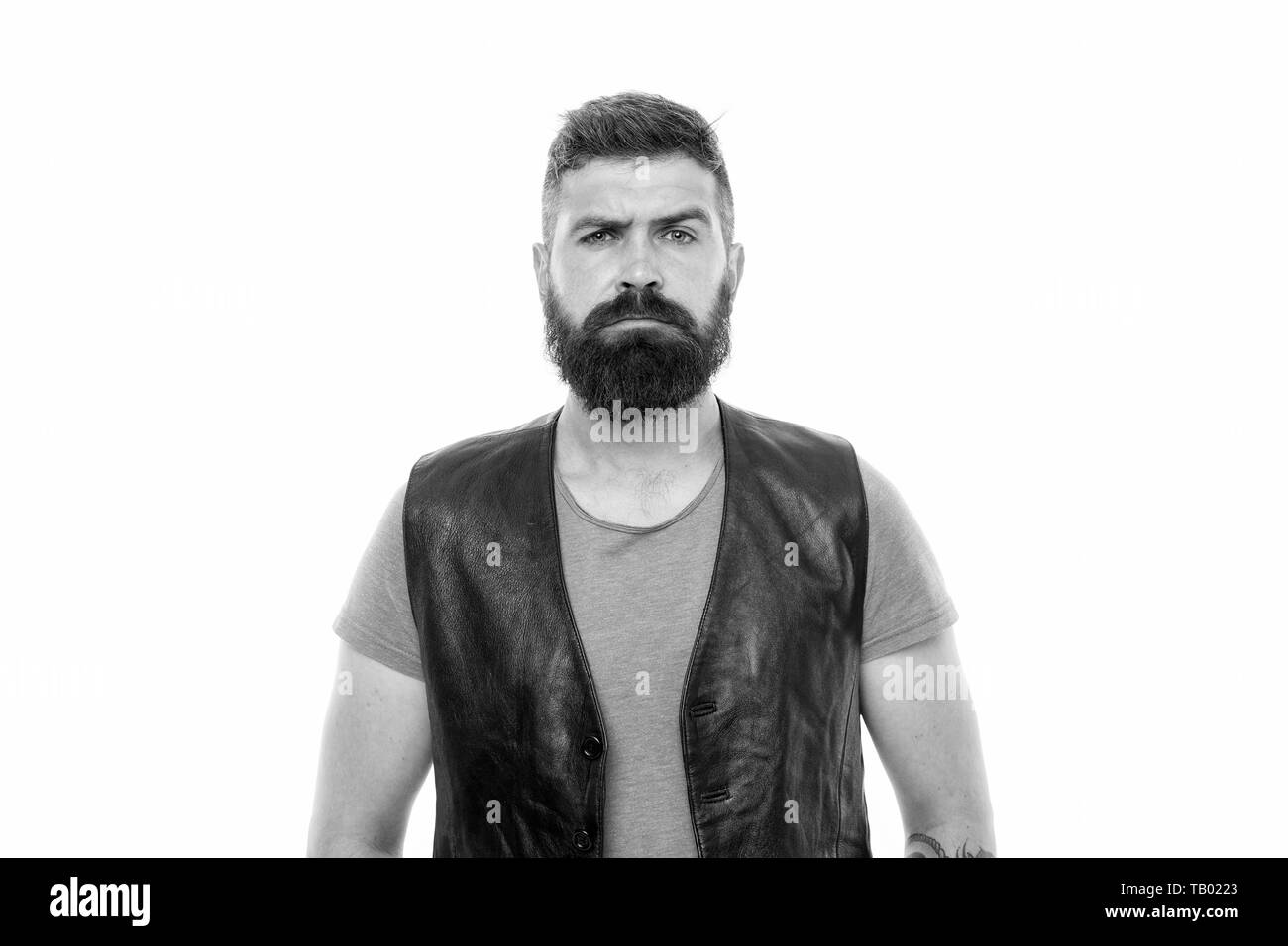 Hipster con la barba brutale guy. Concetto di mascolinità. Barbiere e grooming barba. Lo styling di barba e baffi. Fashion Trend grooming barba. I capelli del viso Trattamento. Mascolinità di brutalità e di bellezza. Foto Stock