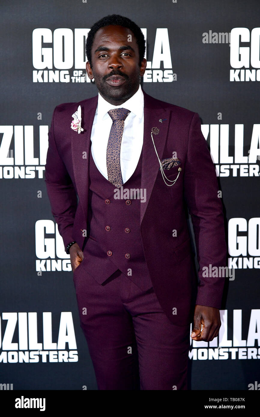 Jimmy Akingbola durante il Godzilla speciale proiezione a Leicester Square a Londra. Foto Stock