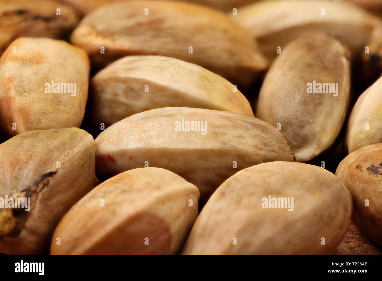 Closeup, il mucchio di materie pistacchi, non torrefatto ancora in tutta la shell. Foto Stock