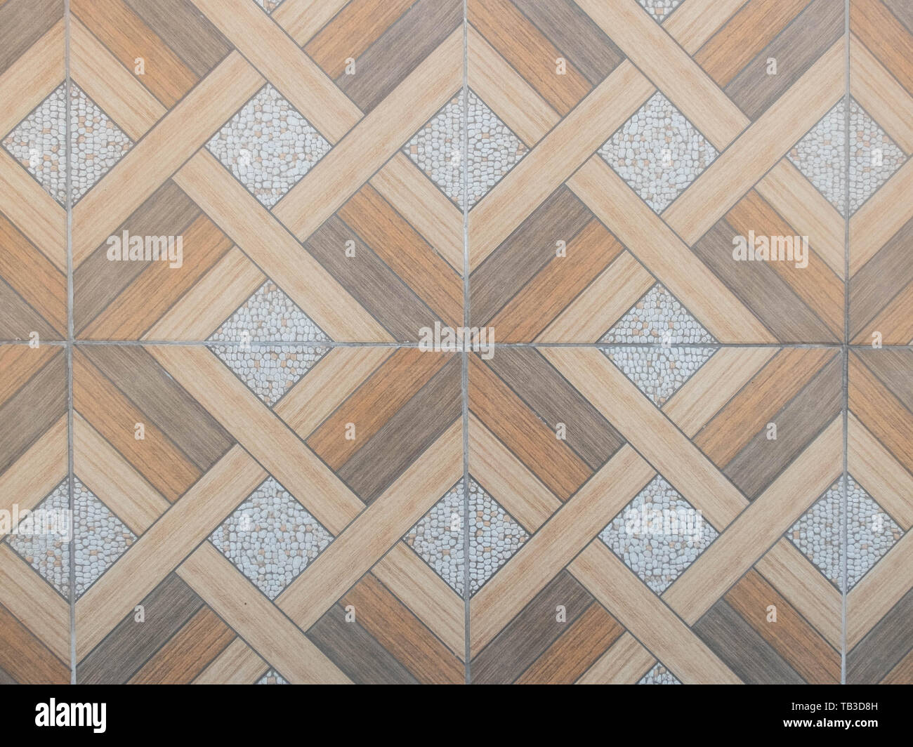 Le piastrelle del pavimento con disegno geometrico. Seamless pattern astratto concetto di sfondo. Foto Stock