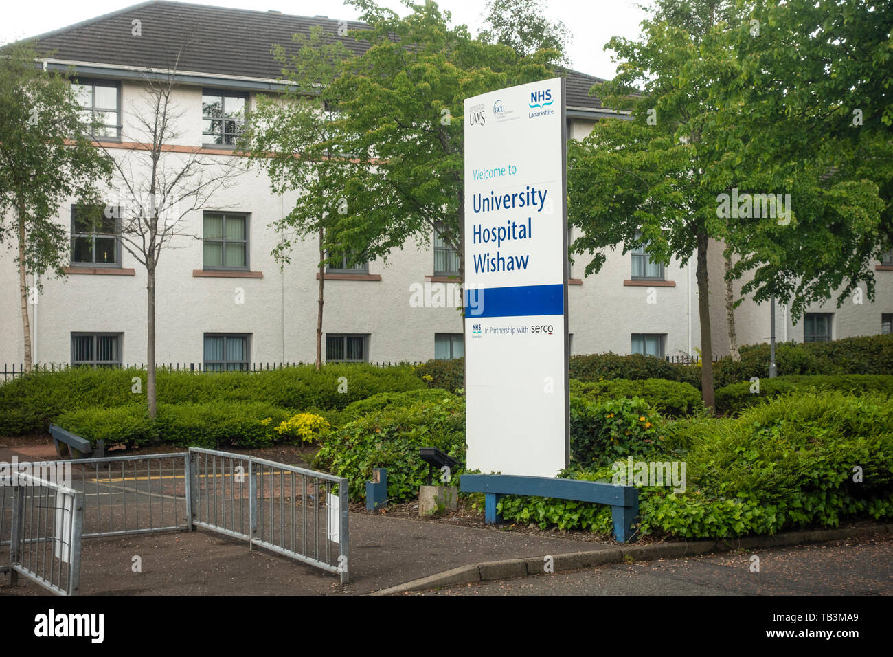 Avviso di benvenuto al di fuori dell'ospedale universitario, Wishaw, un NHS Lanarkshire ospedale. Foto Stock