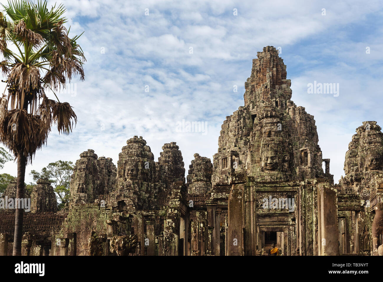 Antico in pietra facce del tempio Bayon, Angkor Thom, Sito Patrimonio Mondiale dell'UNESCO, Siem Reap Provincia, Cambogia, Indocina, Asia sud-orientale, Asia Foto Stock