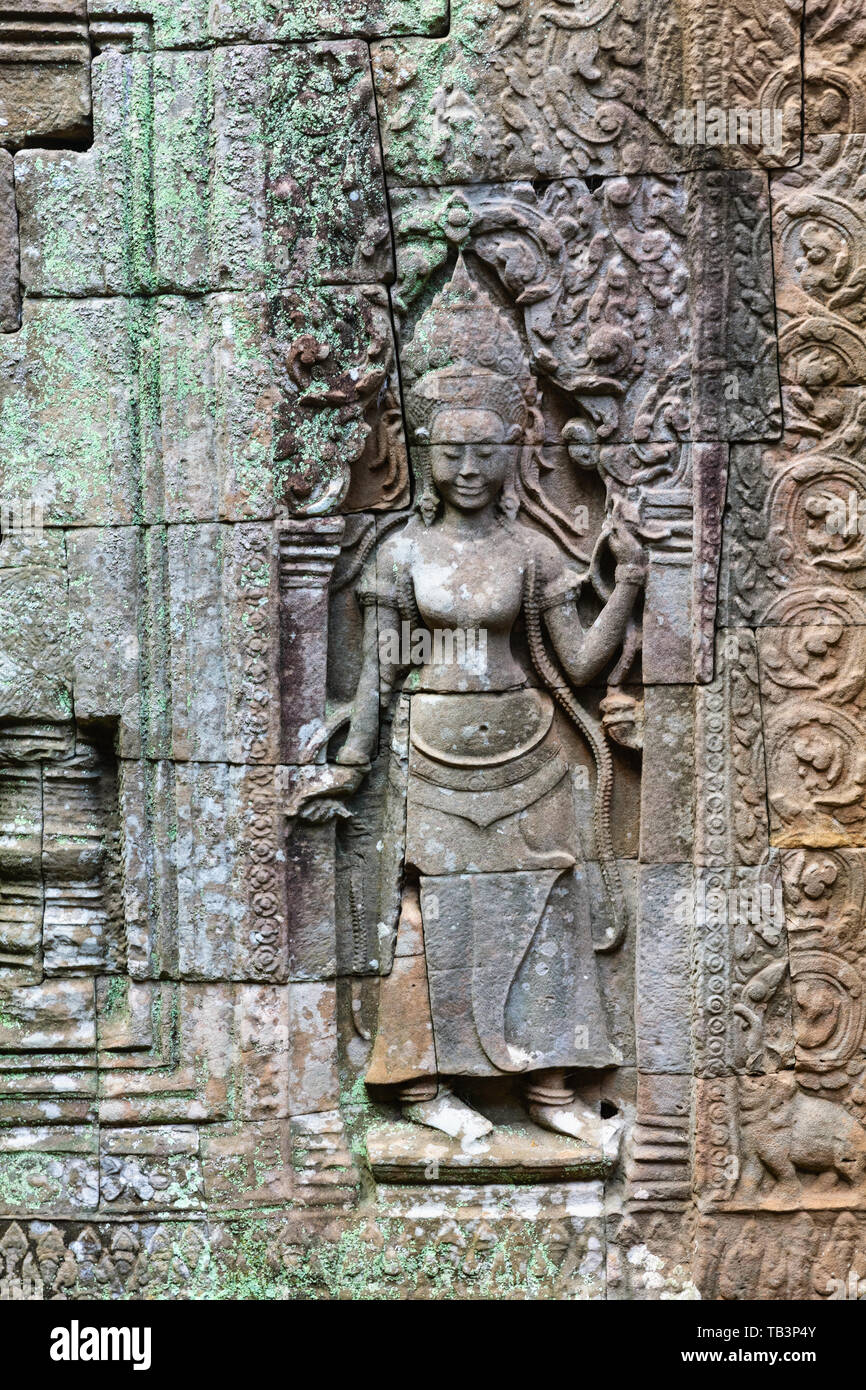 Scultura antica presso il tempio Bayon, Angkor Thom, Sito Patrimonio Mondiale dell'UNESCO, Siem Reap Provincia, Cambogia, Indocina, Asia sud-orientale, Asia Foto Stock