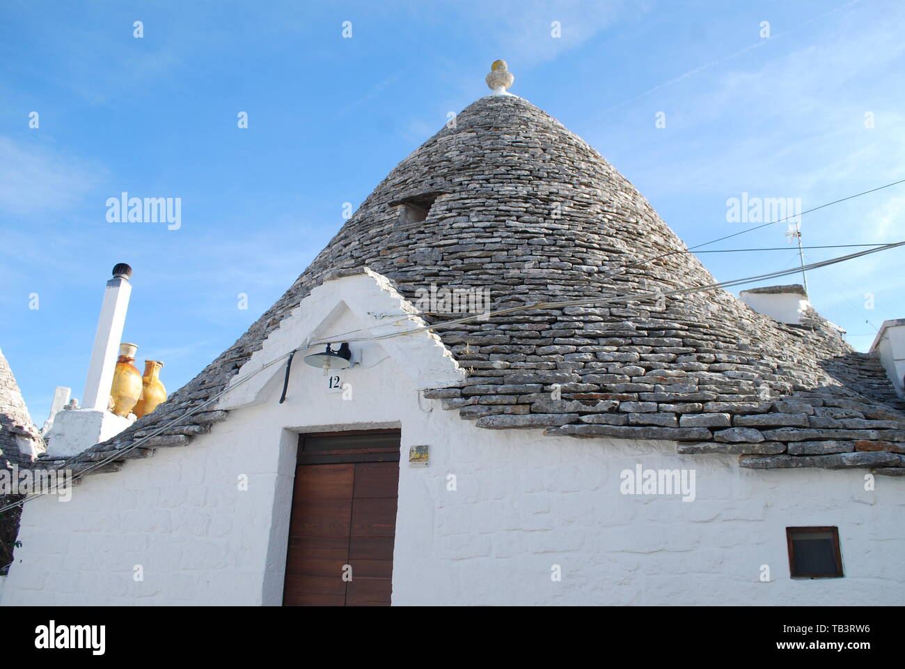 Alberobello, Sud Italia - attrazione turistica - Villaggio con Trullo speciale design del tetto - case Trulli di Alberobello, Puglia Foto Stock