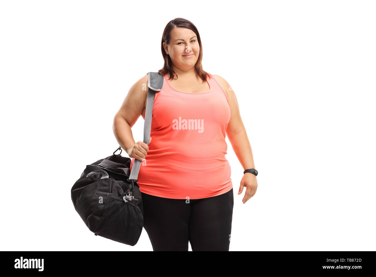 Il sovrappeso donna con una borsa sportiva isolata su sfondo bianco Foto Stock