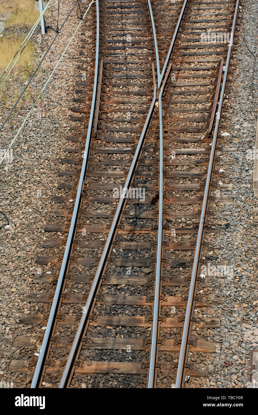 Close up di interruttori rotaie in una giornata di sole Foto Stock