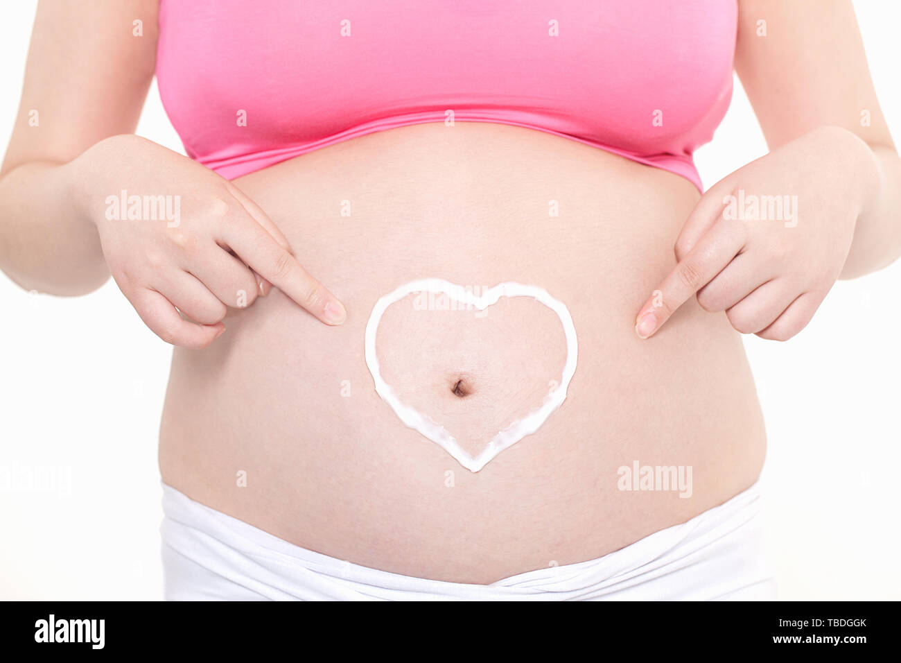 Donne in stato di gravidanza la cura per la crescita del bambino Foto Stock