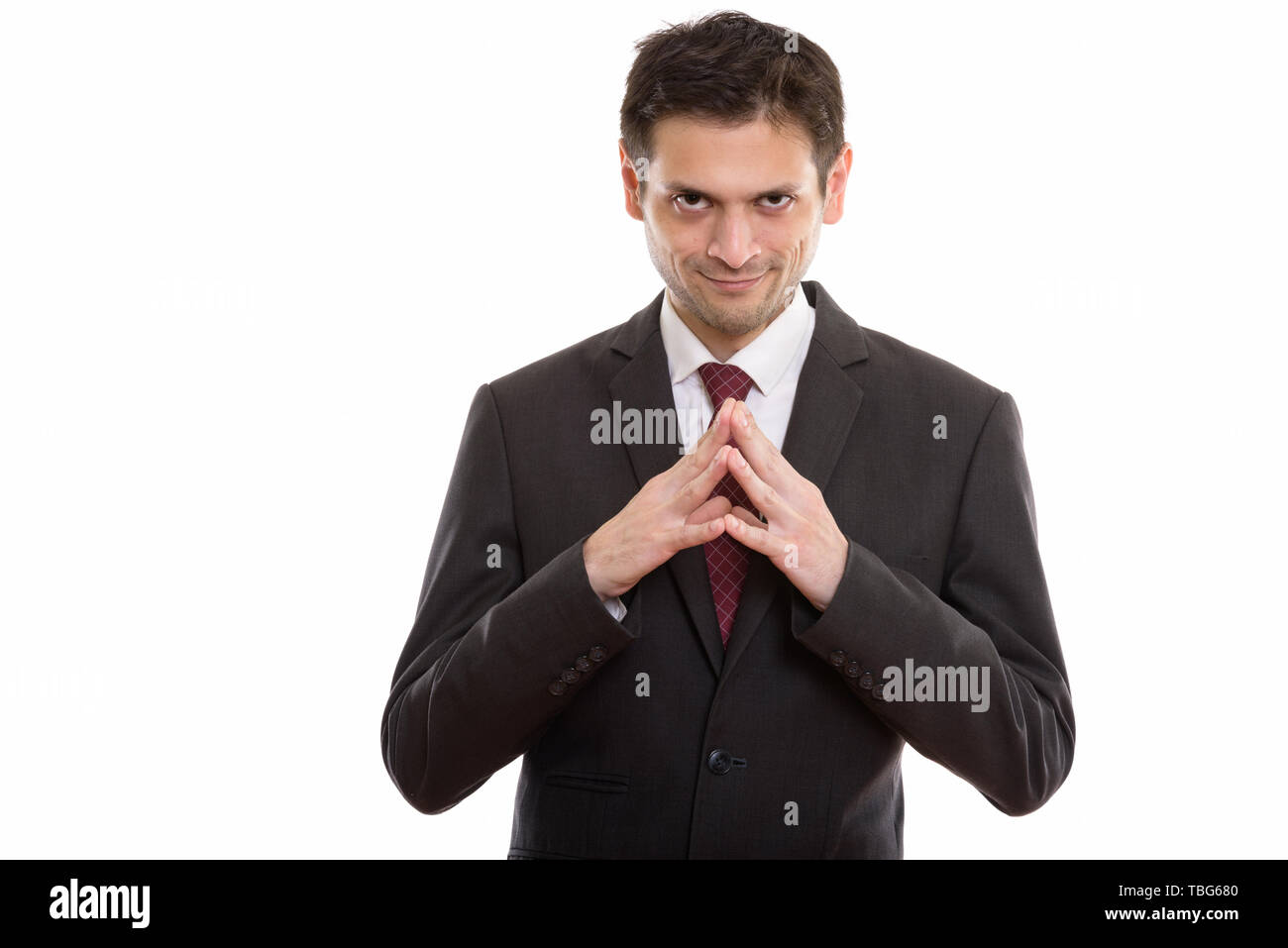 Ritratto in studio di uomo isolato contro uno sfondo bianco Foto Stock