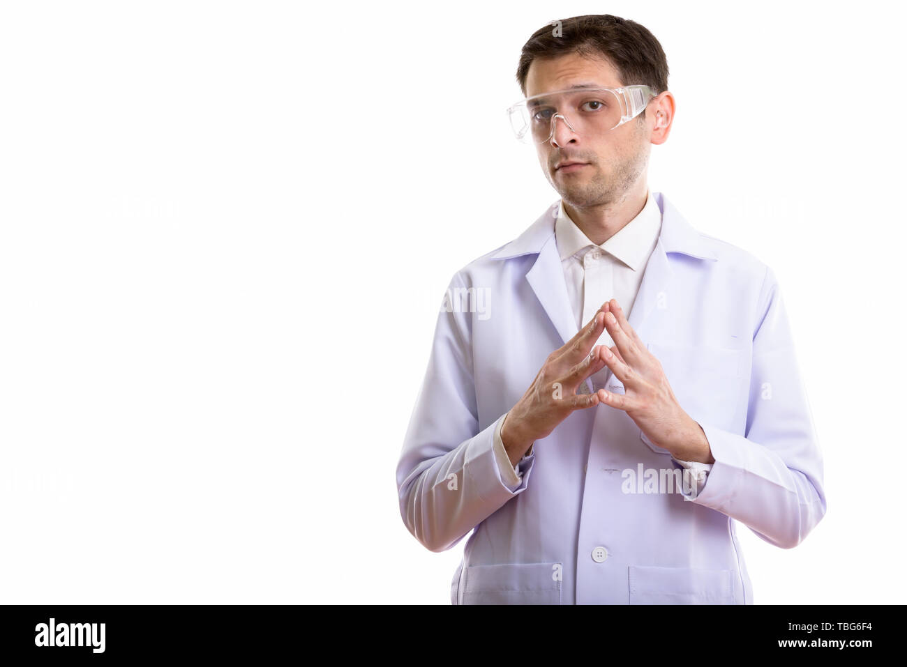 Ritratto in studio di uomo isolato contro uno sfondo bianco Foto Stock