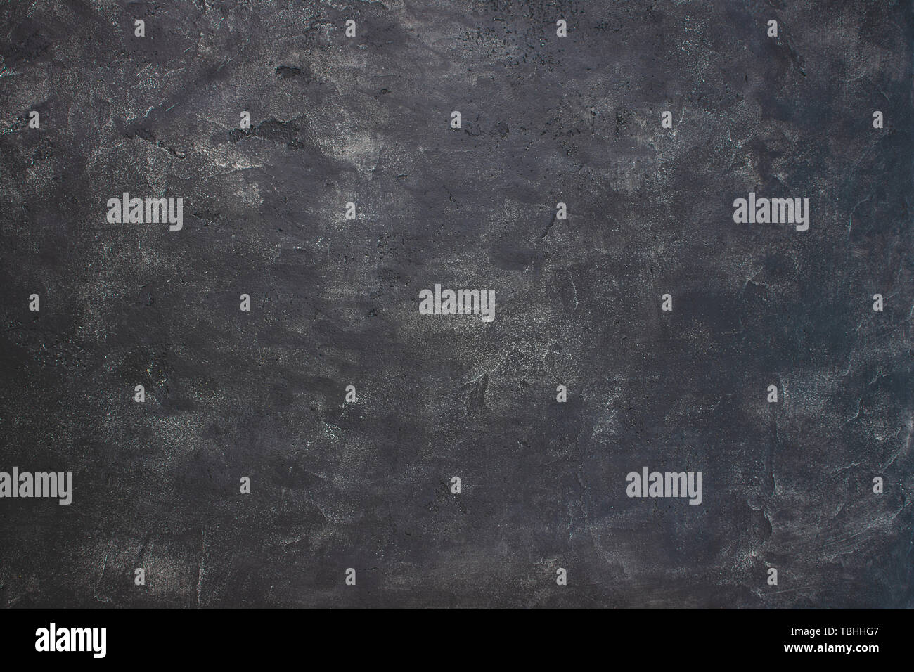 Texture scuro dello sfondo. Parete grunge sfondo. Foto Stock