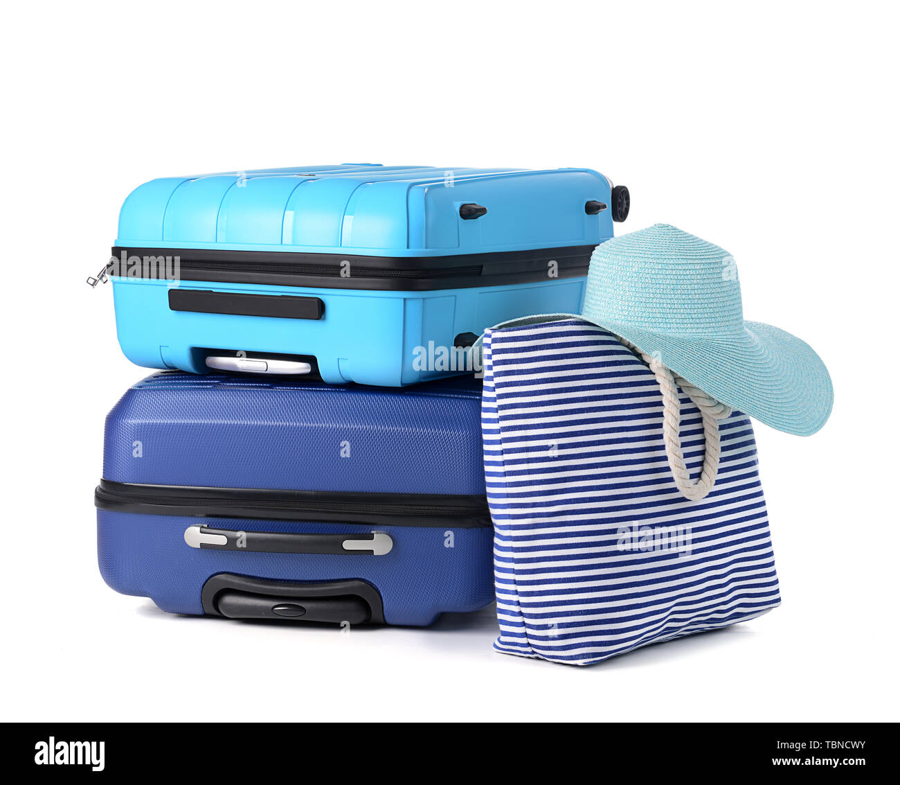 Pranzo valigie e borsa da spiaggia su sfondo bianco. Concetto di viaggio Foto Stock