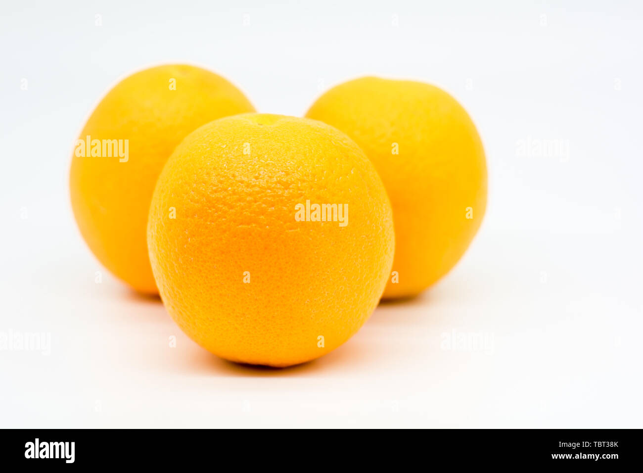 Tre arance. Foto Stock