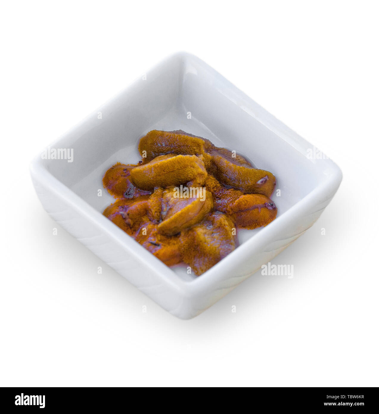 Fresh uni ricci di mare dall'oceano pacifico sulla piastra piccola Foto Stock