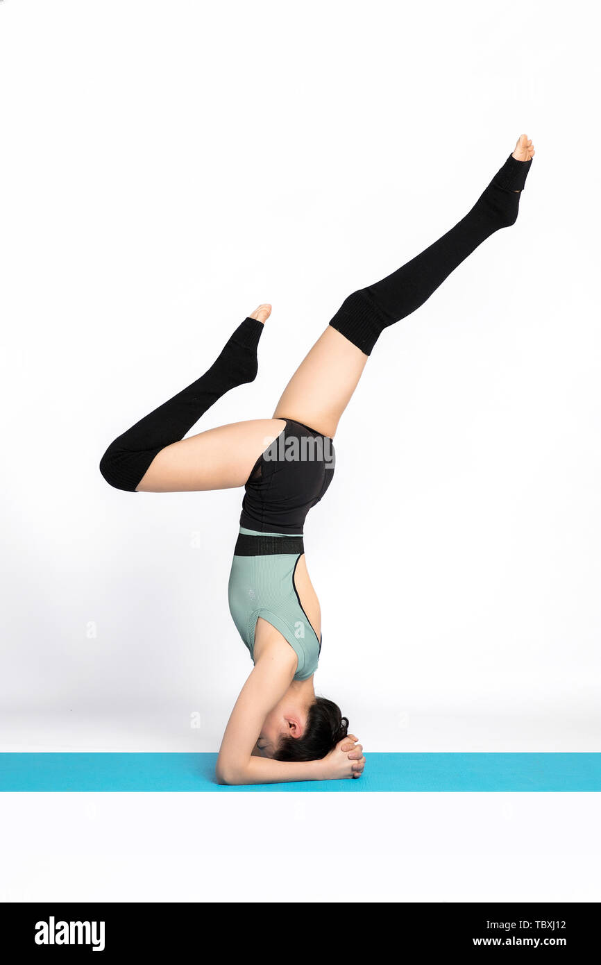 Bella professional insegnante di yoga Foto Stock