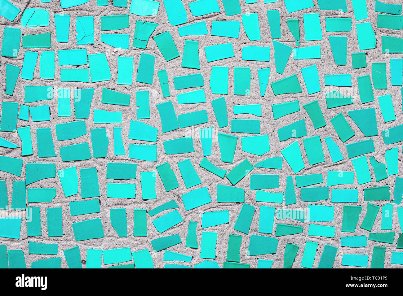 Primo piano della menta alla moda astratto colorato mosaico di piastrelle di ceramica di sfondo modellato Foto Stock