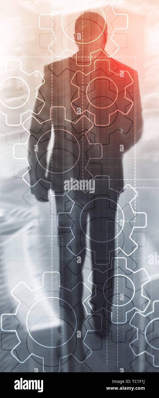 Panorama verticale Banner. Doppia esposizione meccanismo di ingranaggi su sfondo sfocato. Business e automazione di processi industriali concetto. Foto Stock