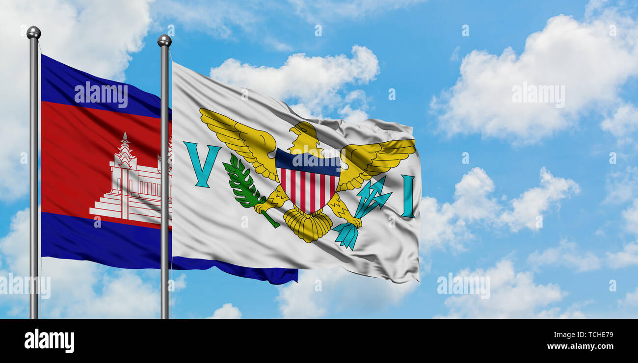 Cambogia e Isole Vergini degli Stati Uniti bandiera sventolare nel vento contro bianco torbido cielo blu insieme. Concetto di Diplomazia e relazioni internazionali. Foto Stock