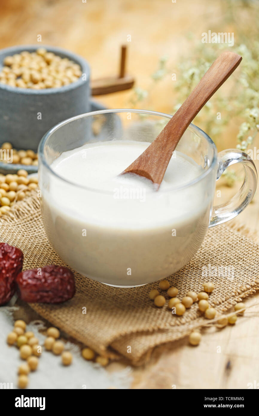 Il latte di soia e mulino in pietra Foto Stock