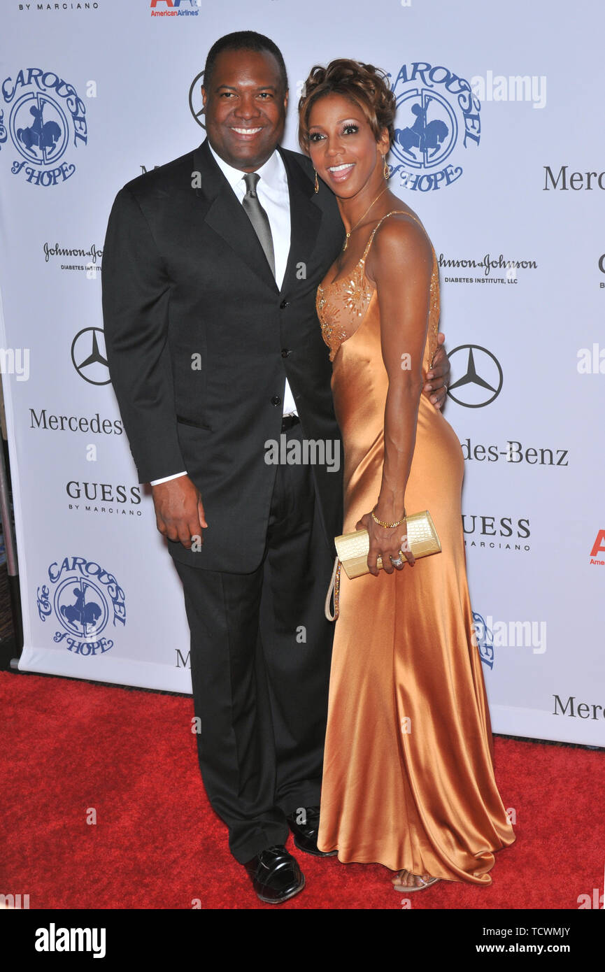 LOS ANGELES, CA. 25 ottobre 2008: Holly Robinson Peete & marito Rodney Peete del 2008 a giostra della sfera di speranza presso il Beverly Hilton Hotel di Beverly Hills, CA. © 2008 Paul Smith / Featureflash Foto Stock