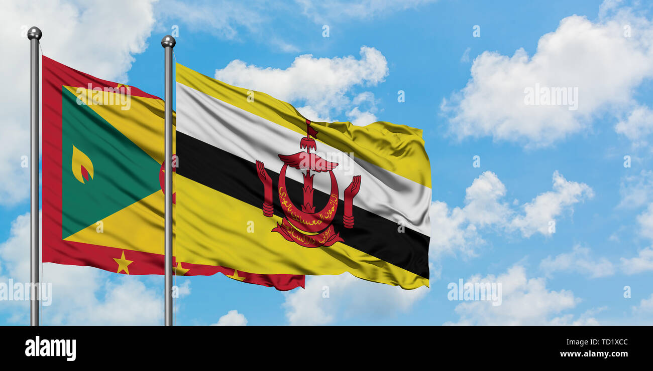 Grenada e Brunei bandiera sventolare nel vento contro bianco torbido cielo blu insieme. Concetto di Diplomazia e relazioni internazionali. Foto Stock