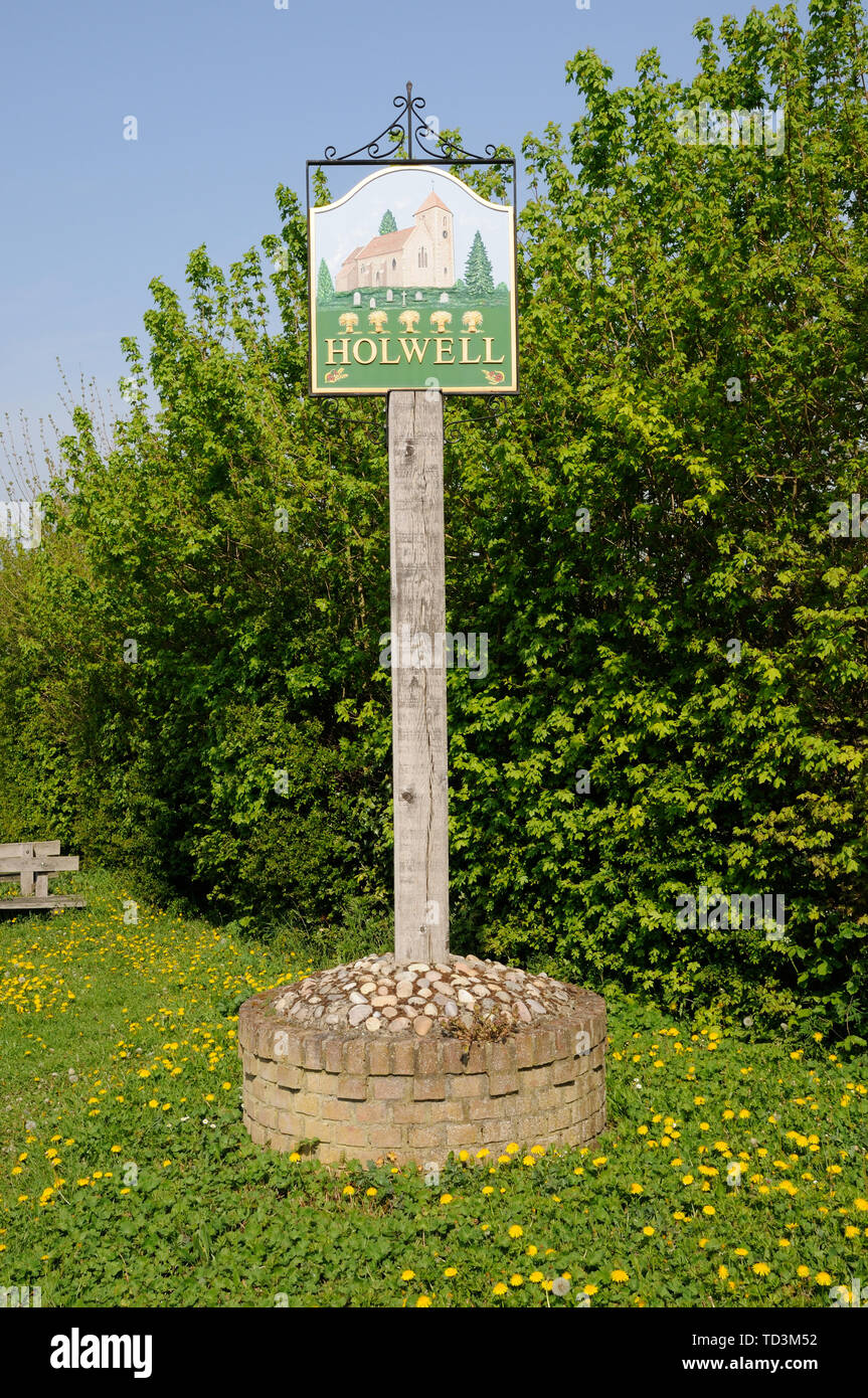 Segno di villaggio, Holwell, Hertfordshire Foto Stock