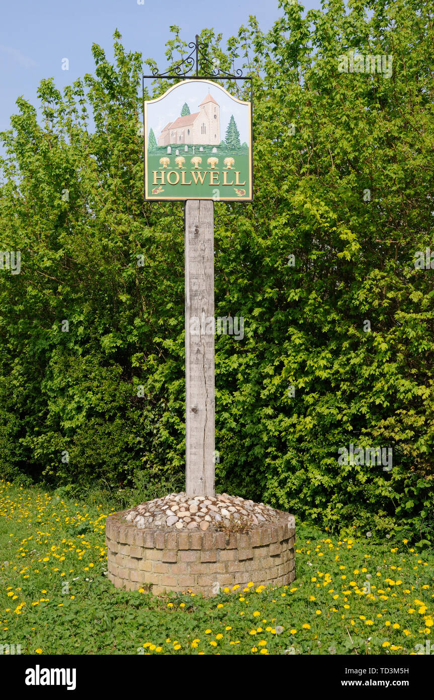 Segno di villaggio, Holwell, Hertfordshire Foto Stock