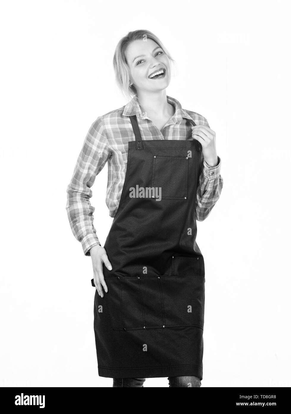 Felice casalinga. Cucinare con passione per la famiglia. Donna in Grembiule da cucina. La cottura del cibo ricetta. Picnic barbecue. Preparazione e culinario. Week-end in famiglia. Pretty girl in grembiule chef. Foto Stock