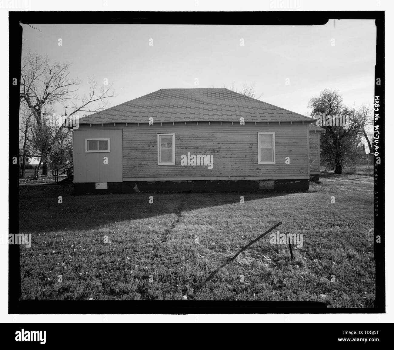 Lato nord, vista da sud - Fort Peck Indian Boarding School, dipendente di quarti, angolo nordoccidentale di Assiniboine Avenue e H Street, pioppo, Roosevelt County, MT Foto Stock