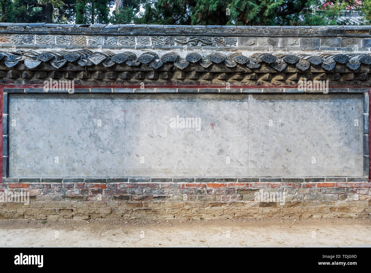 Meng um figlioccio attraverso la scultura in pietra in Mengmiao, Zoucheng Città, Provincia di Shandong Foto Stock