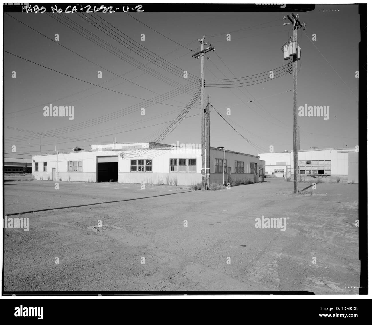 Vista obliqua; telecamera rivolta verso sud-ovest. - Alimentazione navali allegato Stockton, Automotive Repair Shop, angolo nordoccidentale di McCloy Avenue e Ellsberg Drive, Stockton, San Joaquin County, CA Foto Stock