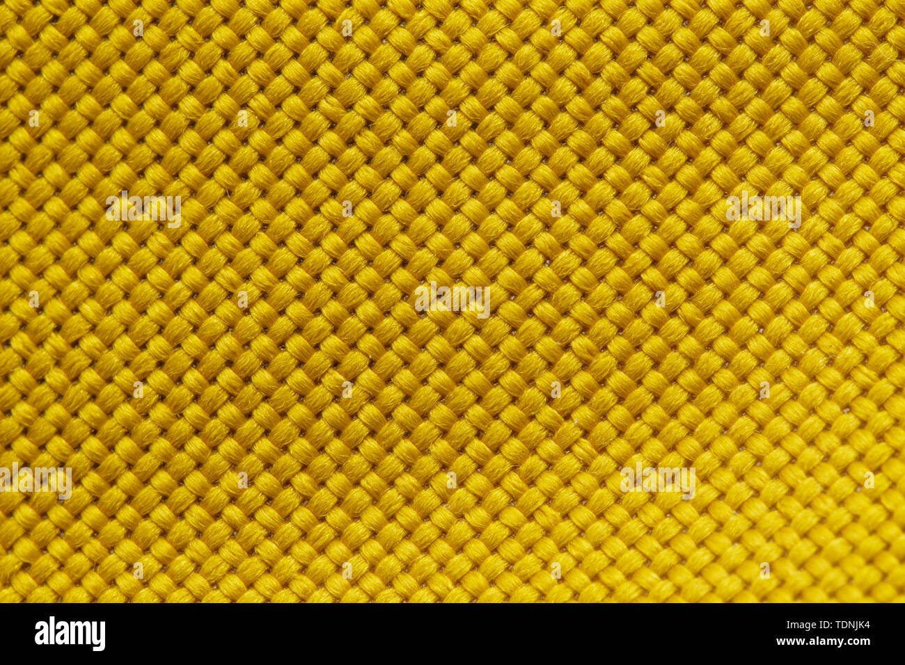 Giallo in tessuto di Nylon sfondo Texture. Tessuto spesso per zaini e attrezzature sportive Foto Stock