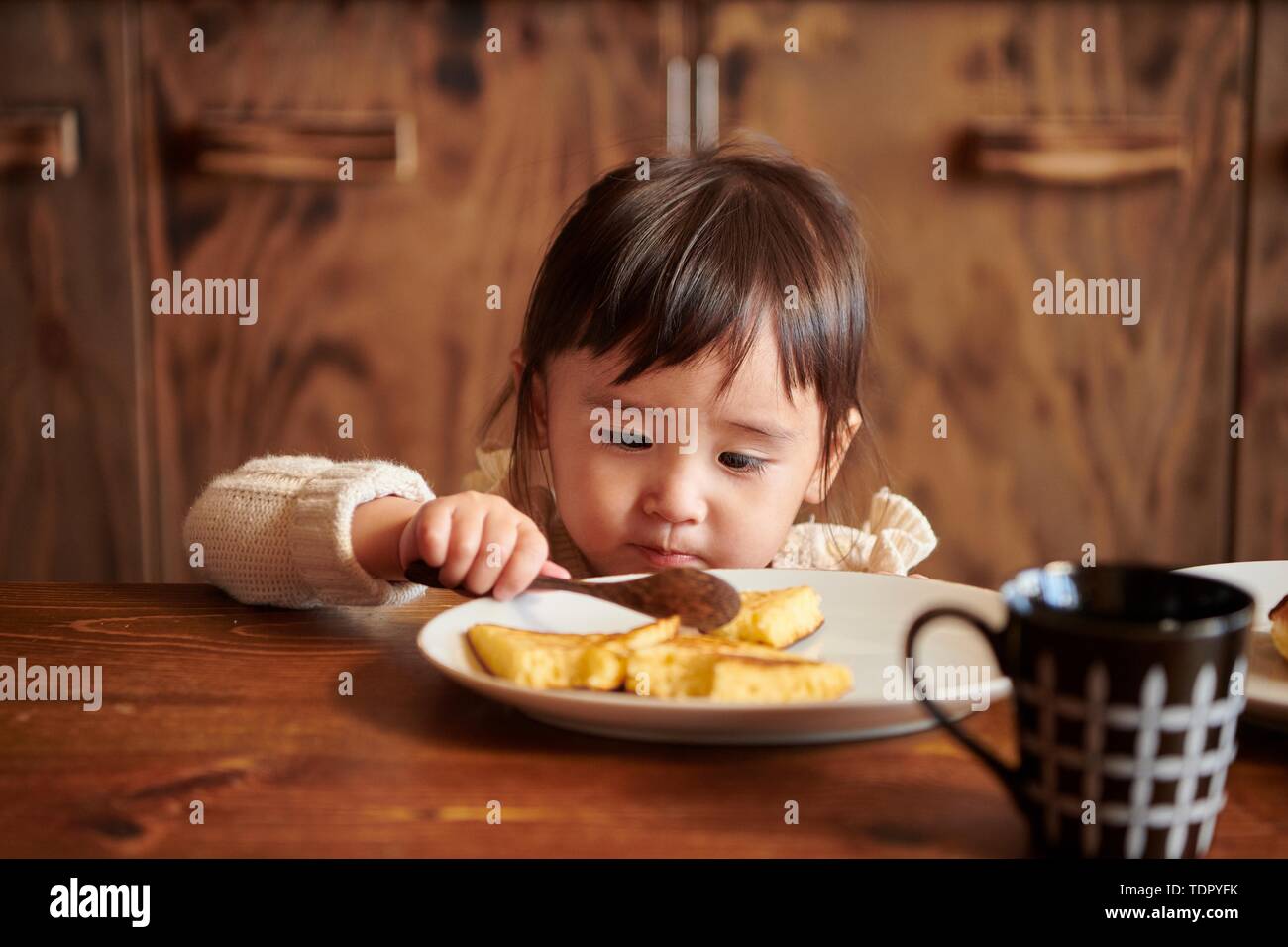Ragazzo giapponese a casa Foto Stock