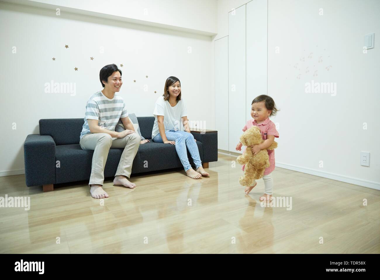 Famiglia giapponese a casa Foto Stock