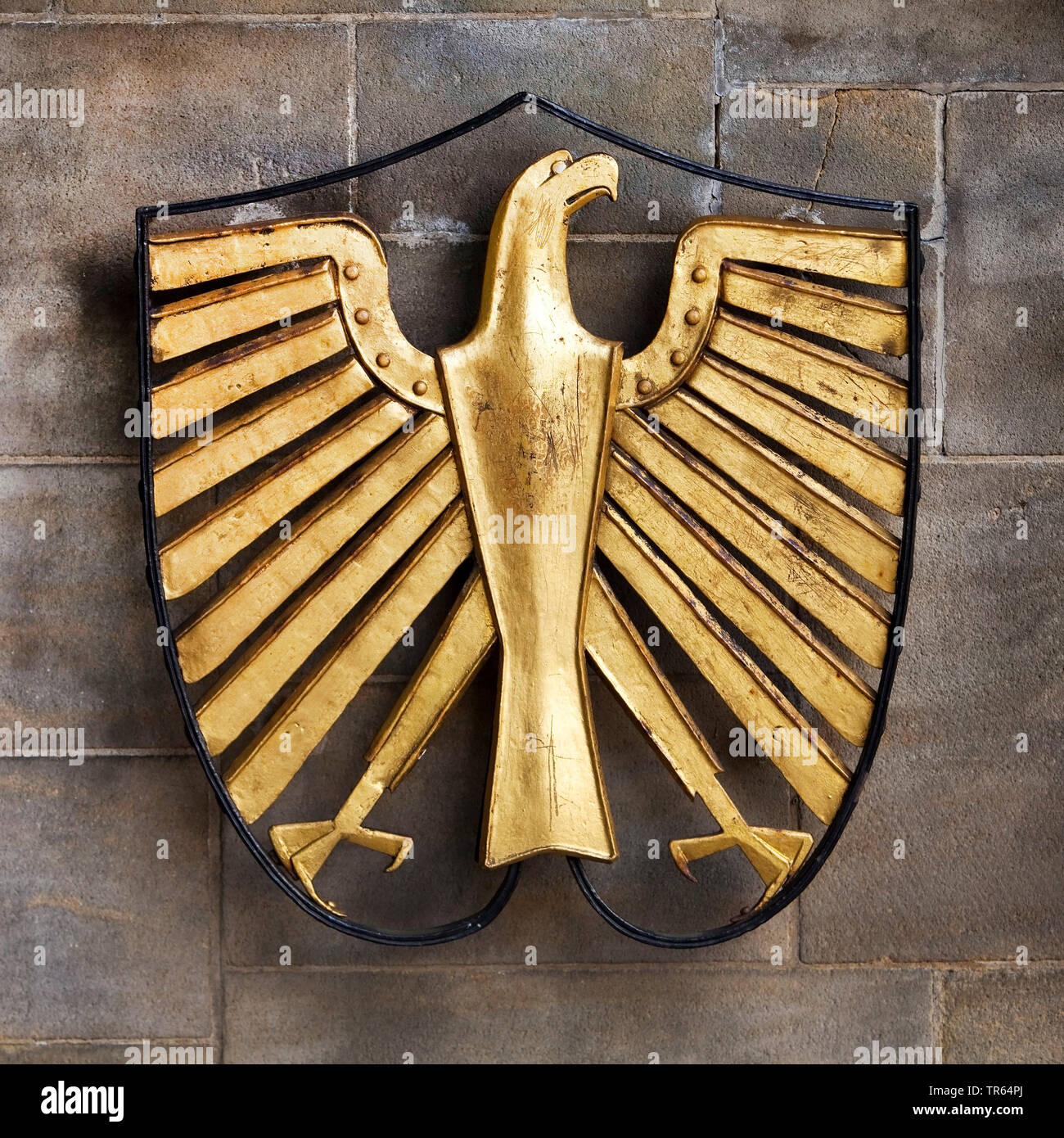 A sinistra guardando aquila federale in corrispondenza di una parete d'ingresso alla Villa Hammerschmidt di Bonn, in Germania, in Renania settentrionale-Vestfalia, Bonn Foto Stock