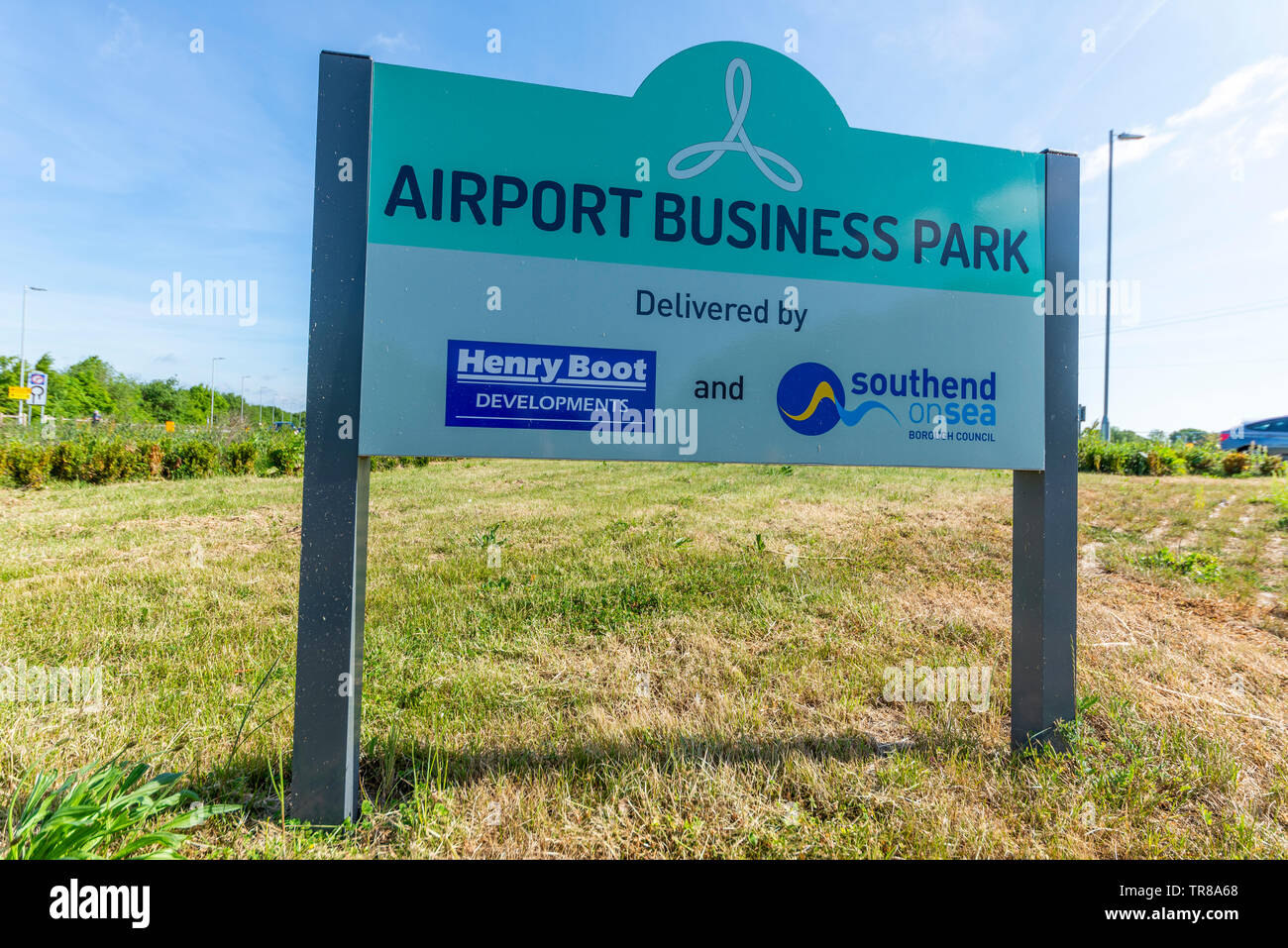 London Southend Airport, Business Park lo sviluppo a Southend on Sea, Essex, Regno Unito. Segno sulla rotonda pubblicità. Henry Boot sviluppi Foto Stock