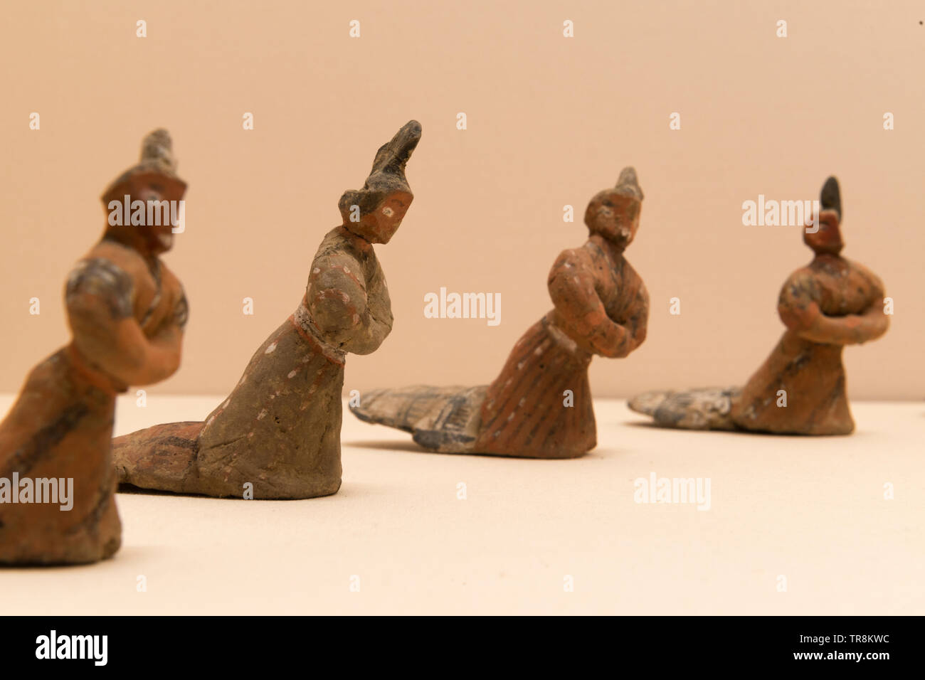 Terra cotta figure danzanti. Il periodo di Stati belligeranti (475-221 a.C.). Il Qi Heritage Museum in Linzi, Shandong, Cina. Foto Stock