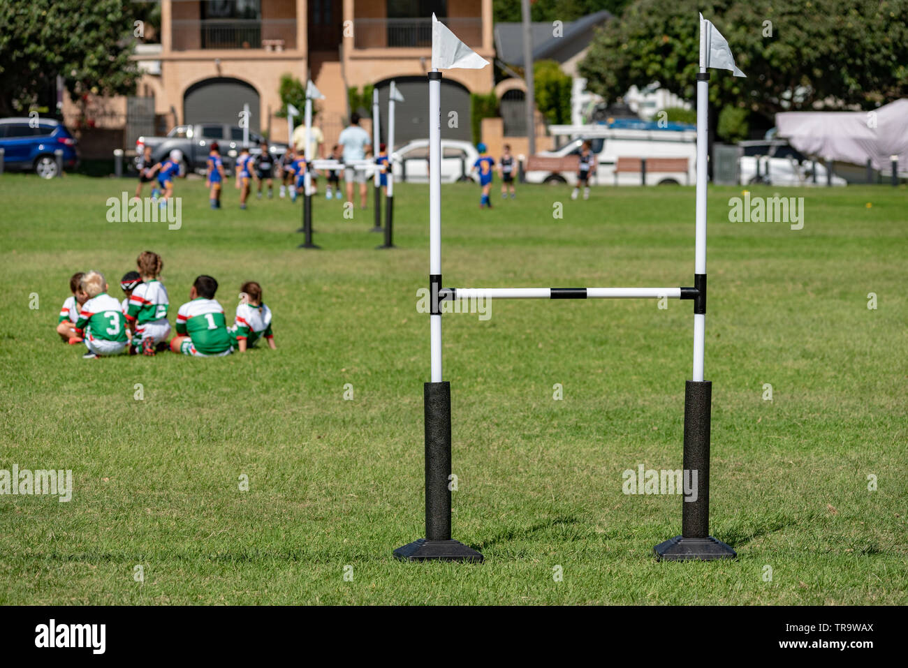 Kids Football Australiani gioco metà tempo di riunione Foto Stock